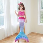 stage for kids A young child in a 3Pcs/Set girls mermaid costume, consisting of a swimsuit, mermaid tail, and bra + panties.