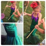 stage for kids A little girl in the A.E-Kids Ariel Little Mermaid Sets Girl Princess Fancy Dress Party Cosplay costume playing with a broom.