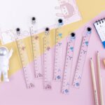 stage for kids Simple Astronaut 15cm Ruler for Students Creative Stationery on a pink background.